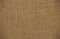 Repair a canvas tarp with a repair kit.
