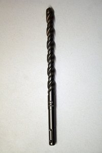Carbide drill bits are used to drill into block and concrete walls.