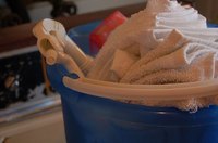 Remove Mop N Glo from linoleum floors with vinegar.