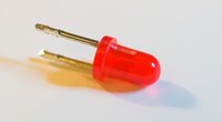 The shorter of the two connectors is the cathode.