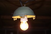 Ceiling light operated by a wall switch