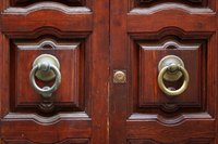 Re-staining fiberglass doors is a good weekend project.