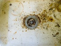 Leftover food and debris can contribute to stinky sink oders.
