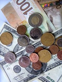 Keep track of the exchange rates when trading stocks outside Canada.