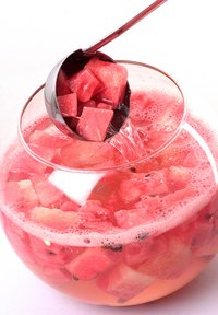 Decorating the punch bowl is a nice touch to the drink table at a party.