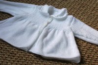 A little girl's version of a swing jacket.