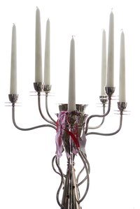 When a candelabra is at a table, it's best to have the candles be above or below eye level.