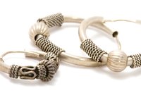 Hoops and studs are most commonly worn in cartilage ear piercings.