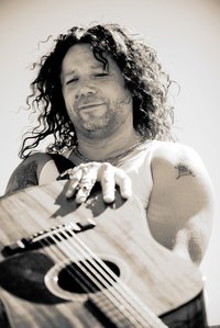 A curly-haired man.