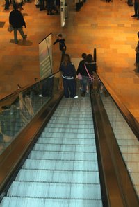 Shopping malls may use optical beam smoke detectors to cover wide areas.