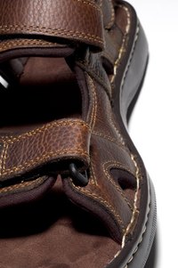 Leather oil and baby powder will stop sandals from squeaking.