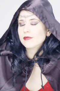 This cloak is held shut with a simple frog clasp.