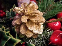 Create festive scented pinecones for Christmas.