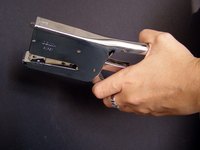 Open the staple channel to refill plier staplers such as the Ace Clipper.