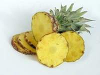 Decorate a pineapple tray for a centerpiece.