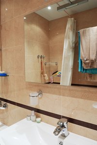 Repair cigarette burns on a bathroom sink with the right products and methods.