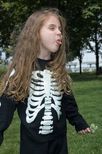 You will need a black outfit to make a hand-painted skeleton costume.
