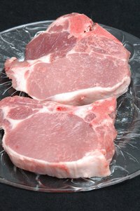 Pork chops before cooking.