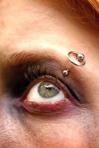 Pierced eyebrows have grown in popularity over the years.