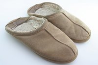 Tamarac slippers are made from suede and shearling, or synthetic materials.