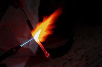 A blue flame burns clean and hot.