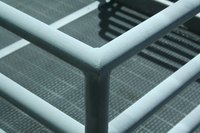 Your stairs can have a simple stair rail, like this one, or a more complex system.