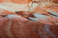 Iron-rich soil is identifiable by its rusty red color.