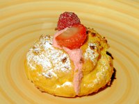 Cream puffs are filled with pastry cream and can be topped with anything you prefer