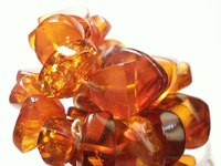 Amber stones are often placed in silver settings.