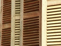 Protect your shutters from the weather by applying a wood sealer.