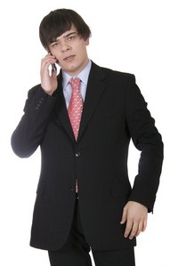 Keep a few sport coat buttons undone for comfort.