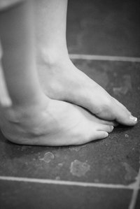 Clear off dead skin from dry feet