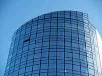Functionalist buildings often lack decorations and utilize smooth lines, creating a streamlined, clean look.