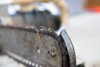 McCulloch chain saws began with a two-man model.