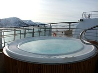 Clean a hot tub before its first seasonal use.