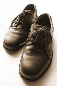 Shine patent leather shoes with beeswax.