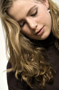 A curly weave will give you long, wavy hair.