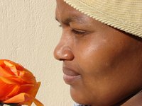 Leukoderma, discoloring or whitening of the skin, is more obvious on darker skin.