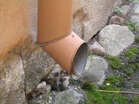 Downspout drains often require drainage pipes to move water away from the building.