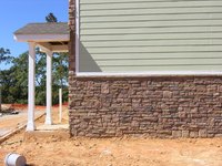Vinyl siding is highly durable but susceptible to cracks in cold weather.