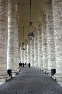 The curved columns of the Vatican are constructed from Travertine stone.