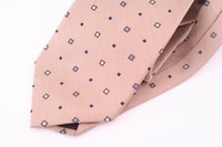 Clean silk ties at home carefully to avoid damaging them.