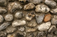Stone cladding sometimes consists of stones glued to the side of a wall.