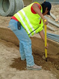 Under the classification approach, a construction worker might be grouped with other laborers.