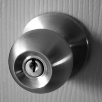 Installing a strike plate is part of door lock installation.