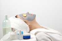 Woman wears a face mask at spa.