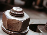 A go/no-go type of gauge checks for proper construction in screws and nuts.
