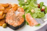 Grilled salmon is a traditional favorite.