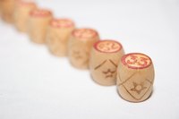 Raffles are often conducted by drawing players' numbers from a pile.