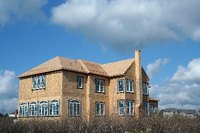 Cosigning on your child's house is a generous gift, but one that comes with risks.
